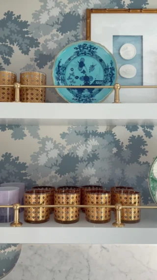 I had a vision for our butler’s pantry coffee bar & sink area when we were renovating & seeing it come to life with these glossy shelves (made by @galdinocustomcarpentry) and unlacquered brass gallery rail has been so exciting! I loved styling these shelves and showing off some of my favorite new and vintage glassware. What do y’all think?! Comment SHOP for all the details in your DM! #grandmillennial #grandmillennialhome #grandmillennialdecor! | https://liketk.it/5cpt2